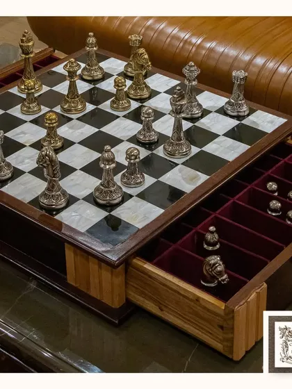 For me, luxury is in the details. This classic chess set, with its mother-of-pearl board and intricately carved metal pieces, is both a game and a work of art. It’s designed for the sophisticated thinker who appreciates intellect and elegance in their home.