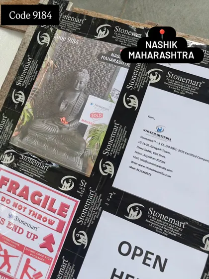 A close-up of the packing for a Buddha fountain. We even attach a photo of the product to the outside of the crate for easy identification upon arrival.
