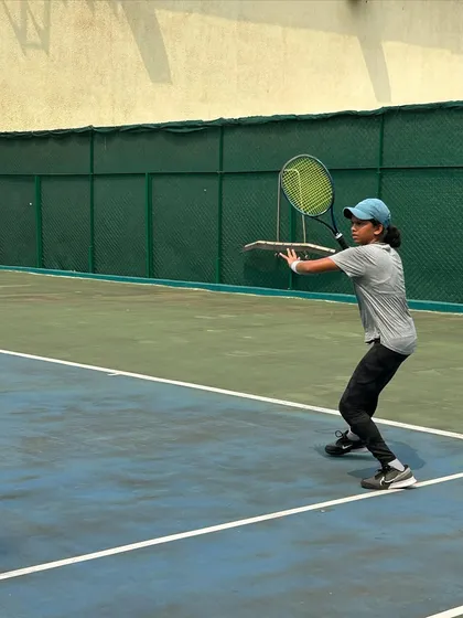 A young player with excellent form on his backhand during the MSSA tournament.