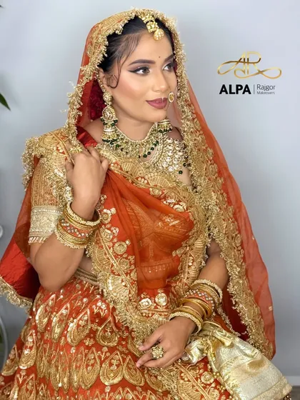 The bride looking to the side, showcasing the contour and highlight on her cheekbones.
