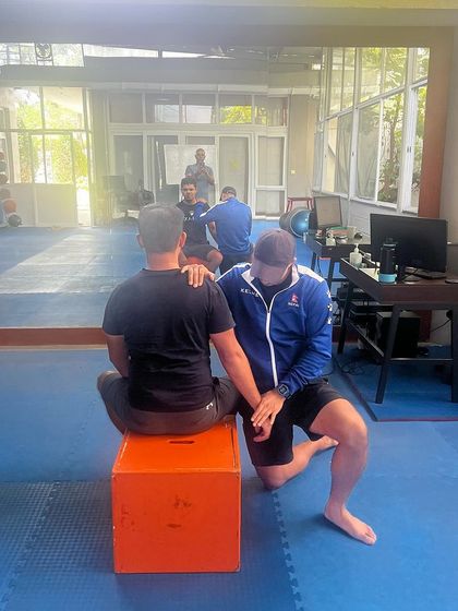 I am proud of the physiotherapy system we have built. Here, our Head Physio assesses an athlete's shoulder mobility, a critical aspect of a healthy and efficient golf swing.