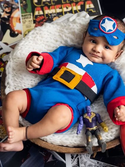 With a determined look, our mini Captain America is prepared for any mission. We have a collection of superhero costumes to make your child's dream shoot a reality.