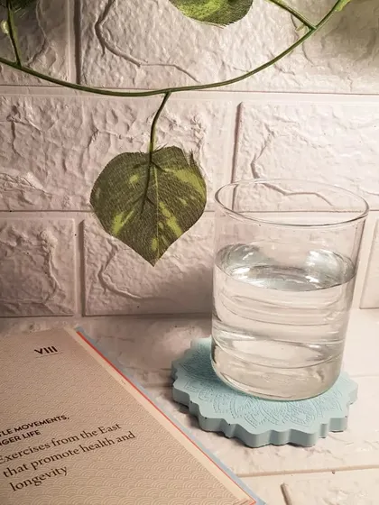 Another shot of the coaster in a real-life setting, adding a touch of intentional design to an everyday moment.