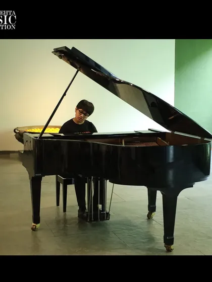 A student pianist performs on a grand piano at the Zirad Art & Heritage Foundation. We seek out unique performance opportunities for our students in inspiring settings.