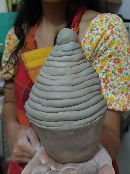 This student created a whimsical coiled pot that looks just like a cupcake. It’s so fun to see the imaginative ideas that come to life in the studio. Pottery is a wonderful medium for expressing creativity.