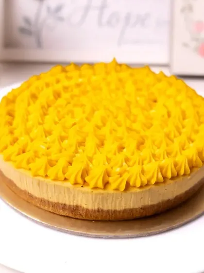 Our Mango Cheesecake is a seasonal delight. The creamy texture of the cheesecake is infused with the sweet, tropical flavor of fresh mangoes.