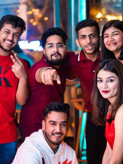 A group of guys having a great time at The Fixx Bar.