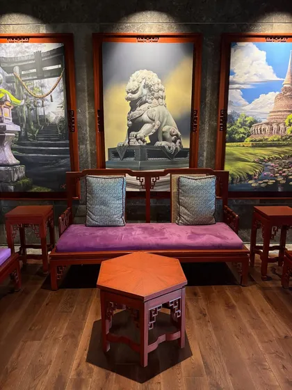 Another shot of the oriental inspired decor at 32 East. The rich colors and textures of the furniture make for compelling visual content that highlights the restaurant's theme.