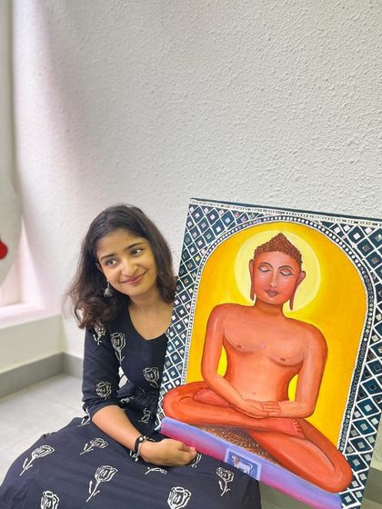 Holding my completed Mahavir Swami painting. Creating this artwork was a journey of devotion and artistic exploration, and I am so proud of the final result.