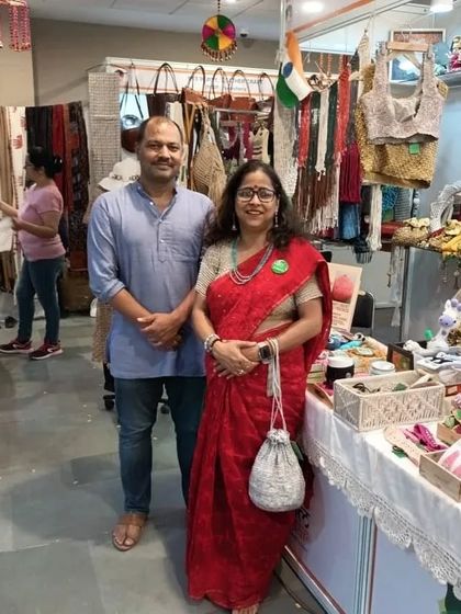 With a visitor at our exhibition stall. These events give us the confidence to continue our mission of creating unique and sustainable handmade products.