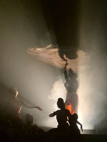 An artistic shot capturing the silhouettes of our dancers through a haze of stage smoke. This highlights the beautiful and often mysterious visuals we create on stage.