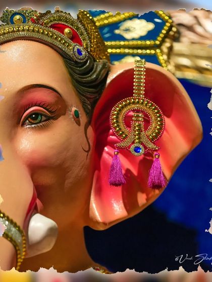 An artistic close-up of the Sanpada Cha Raja's ear and earring, showcasing the detailed ornamentation.