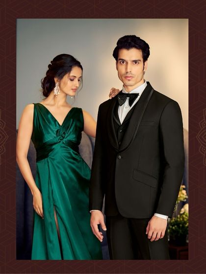 Where style meets sophistication. This classic black tuxedo with a shawl collar is designed to elevate your wardrobe and make a statement at any formal event.
