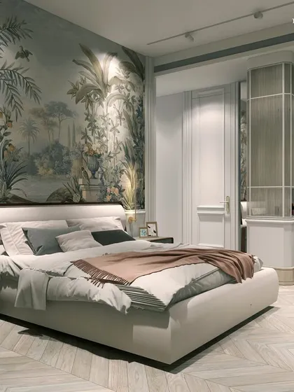 A beautiful bedroom featuring a full-wall scenic mural that acts as a dramatic headboard. The design sets the stage for beauty in tranquility, with chevron wood floors and a soft color palette enhancing the room's understated luxury.