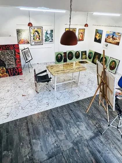 A wide-angle view of my studio, showing the gallery walls filled with various completed artworks. This space is both my workshop and my showroom, where every piece is on display before it finds a new home.