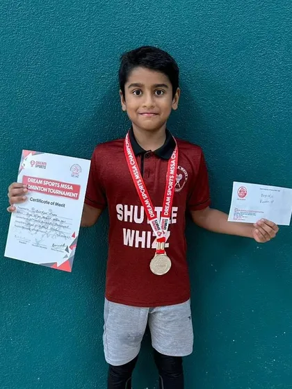 Ajinkya Desai beaming with his runner-up medal in the Boy's Singles U-12 category at the MSSA Inter-School Badminton Championship.