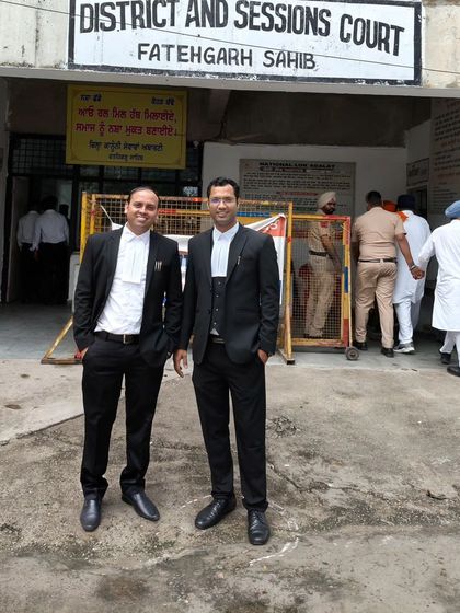 Advocates from our firm outside the court in Fatehgarh Sahib. This demonstrates our capability and willingness to travel and manage cases in different jurisdictions to serve our clients' needs effectively.