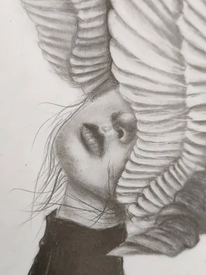 A close-up of the surrealist wing portrait, focusing on the woman's face and the texture of the feathers.