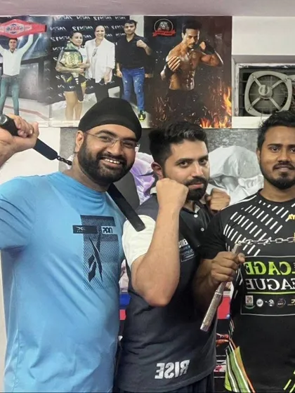 Posing with students after a nunchaku training session. It's a difficult skill to master, but very rewarding.
