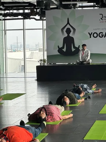A moment of deep relaxation in Savasana during a corporate event for International Yoga Day. I guide employees through calming sequences that help quiet the mind and restore energy, which is essential for a balanced and productive work environment.