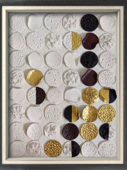 Another version of 'The Dancing Squad', this one framed and ready for a client. This piece uses a variety of textures on the discs, from smooth to rough to metallic, to represent different personalities within a group.