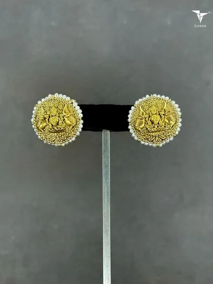 A different view of my classic Maa Laxmi 22kt gold earrings, showcasing the fine detail and the beautiful pearl border. A true piece of heritage jewellery.