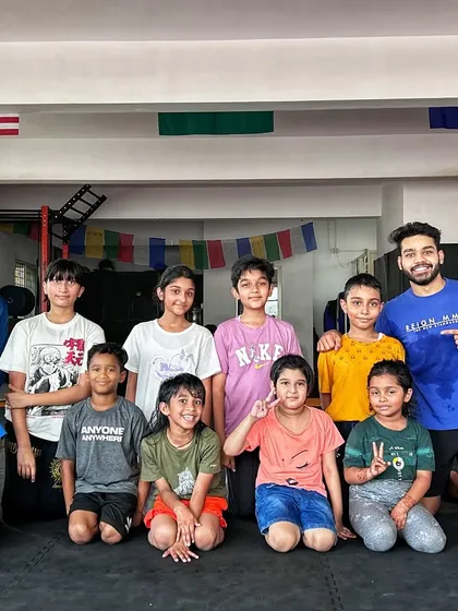 The MMA Summer Camp crew with their coaches. We had a blast teaching this group the fundamentals of kickboxing and Jiu-Jitsu through our unique, game-based methods.