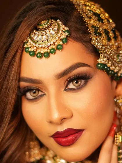 An intense close-up showing the detail of the eye makeup and the beautiful contact lenses that complete the look.