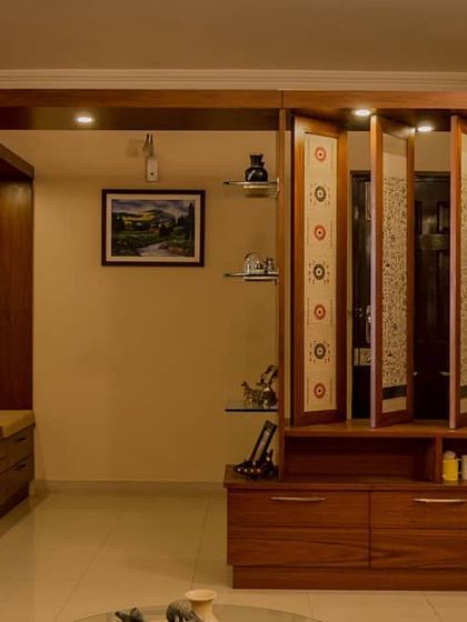 Another view of the pivoting partition, demonstrating its function. This kind of kinetic architecture adds an interactive and surprising element to the interior design.