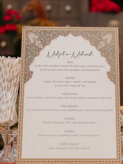 A beautifully designed bar menu for a "Mehfil-e-Mehendi," featuring elegant calligraphy and intricate border details that matched the overall theme of the event.