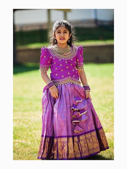 A beautiful custom creation for a special client. This lilac Pattu lehenga is paired with a rich purple blouse featuring detailed maggam embroidery.