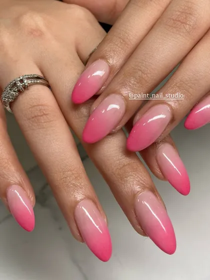 A beautiful, classic pink ombré on long, almond-shaped nails. The gradient is seamless and the color is perfect for any season.