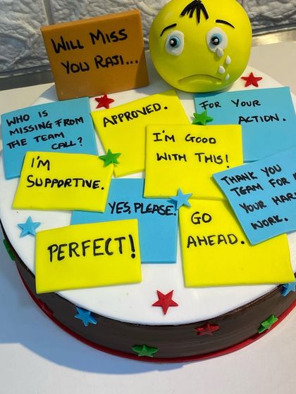 A detailed shot of the funny and relatable messages on the farewell cake.