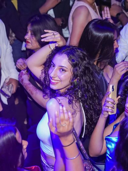 A candid moment from a Thursday ladies' night at Toca. It's all about creating a fun and safe environment where everyone can have a great time.