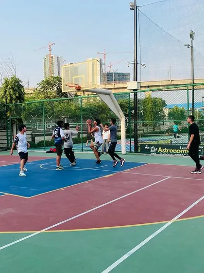 A player finishes a layup during a fast break. We love to play an up-tempo game.