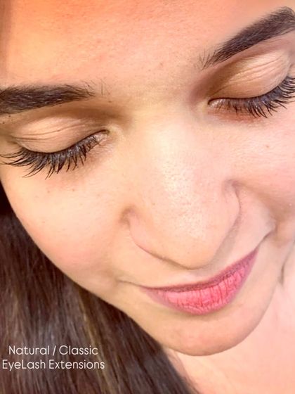 A beautiful example of a Natural Classic set. The extensions blend seamlessly with her real lashes, adding just the right amount of length and fullness for an everyday polished look.