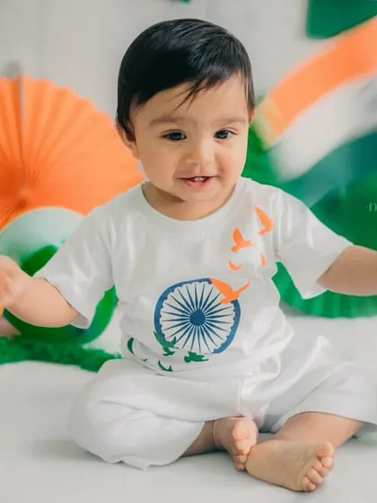 Waving the tiranga with so much joy. It's wonderful to capture these moments of national pride, even with the littlest citizens.