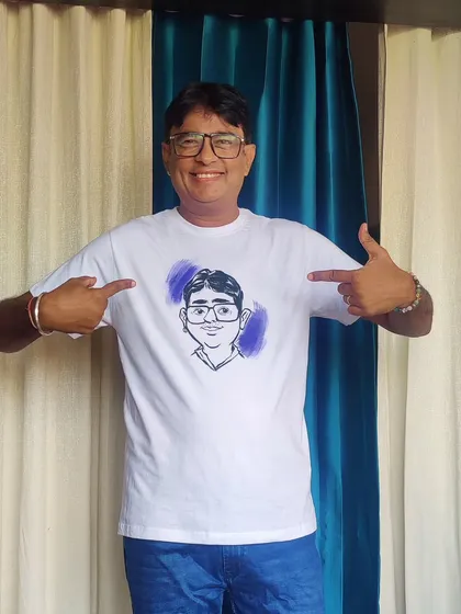 Another happy customer showing off his custom caricature t-shirt with a thumbs-up. A great personalized item for any occasion.