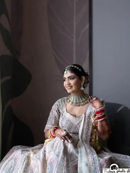 My beautiful bride Disha, ready for her Pheras. She looked like a dream in her white and pink lehenga. The makeup was kept soft and romantic, with pink tones on the eyes and cheeks to create a cohesive, angelic look.
