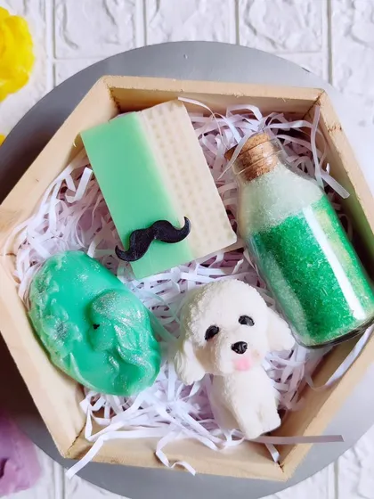 The same unique hamper from a top-down view, showing the fun and eclectic mix of handmade soaps.
