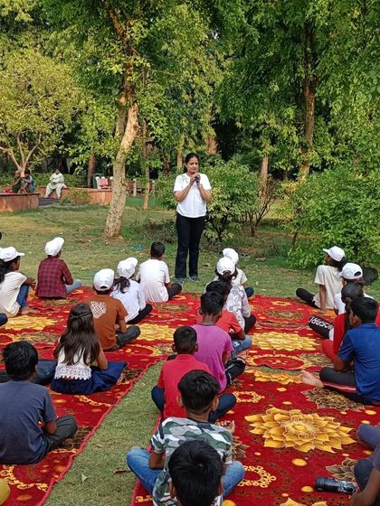 Teaching a group of children from the Gyan Adhar NGO in a park. It is so important to create a supportive and encouraging environment for them to learn and practice yoga.