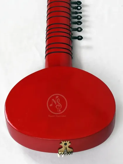 The back of our solid red Zitar. The flat back makes it comfortable to hold and play, similar to an electric guitar.