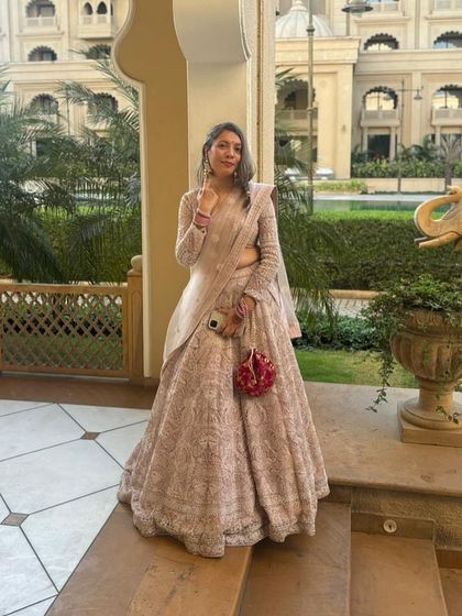 Another beautiful client in our pastel chikankari lehenga. We love helping you find the perfect outfit for your special occasions.