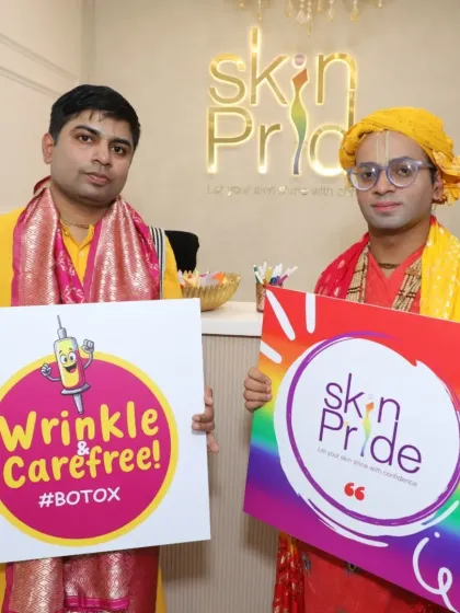 Two happy clients at our grand opening event, celebrating our services like Botox that leave you "Wrinkle & Carefree!"