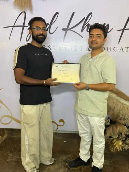 This student worked hard to perfect his techniques, from curls to updos. He is now ready to take on advanced hairstyling jobs with confidence.
