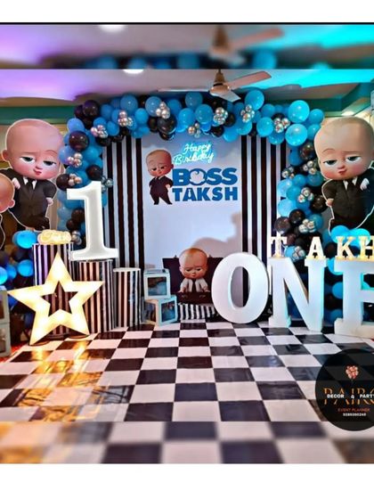 A stylish Boss Baby theme with a black-and-white striped backdrop and a checkered floor for a modern look.