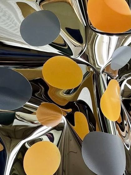 A close-up detail of a new polka dot piece, challenging the viewer to guess the final shape of the artwork.