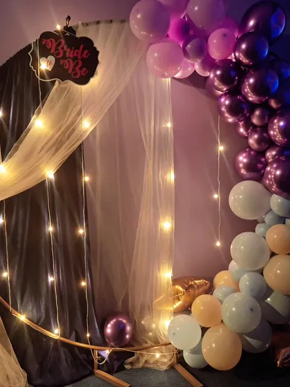 Another look at the beautiful and elegant backdrop for a bridal shower, perfect for photos and creating a celebratory atmosphere.