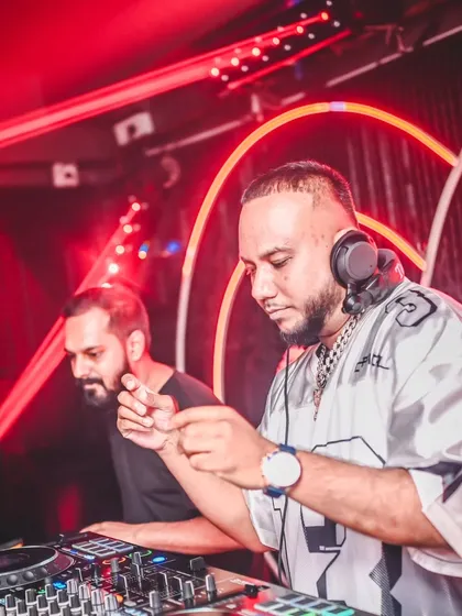 Locked in and focused on the mix. I bring my A-game to every set, blending tracks and reading the crowd to keep the energy high all night long. This is the craft behind the party.