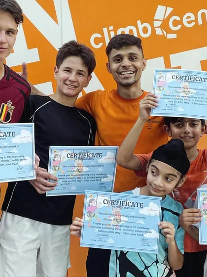 Mission accomplished! These happy campers are showing off their completion certificates after a fantastic 5-day summer program filled with climbing and team-building.